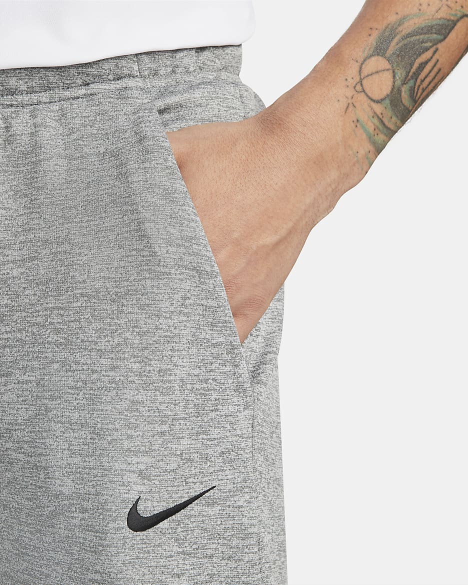 Pantaloni fitness affusolati Therma FIT Nike Therma Uomo. Nike IT